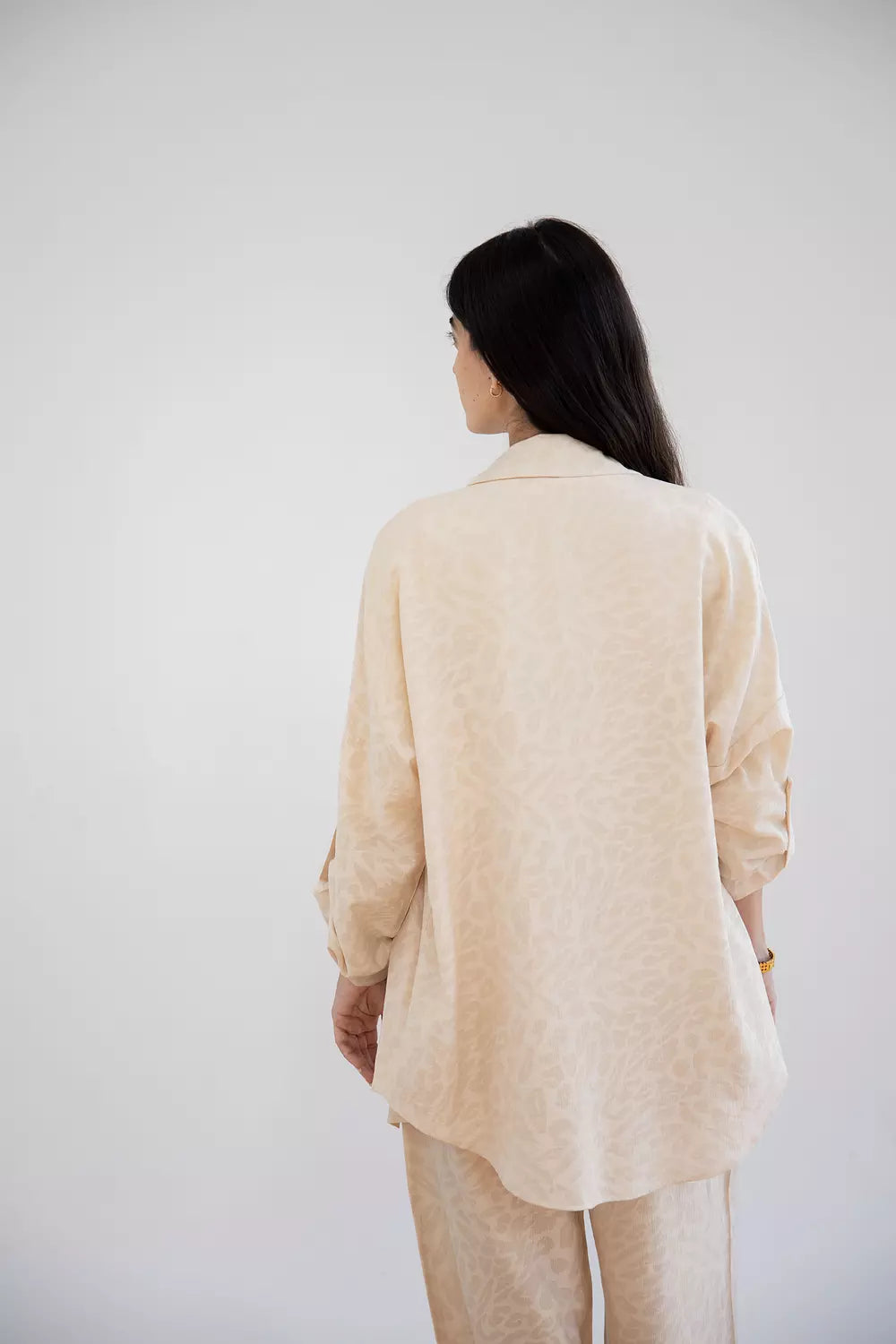 A Female Roar set in beige